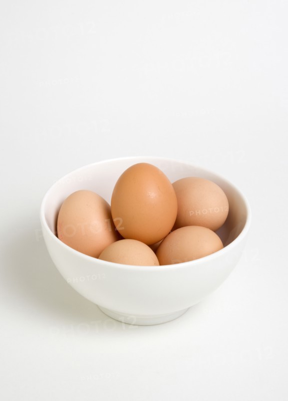 FOOD, Uncooked, Eggs, Free range eggs in a bowl on a white background.
