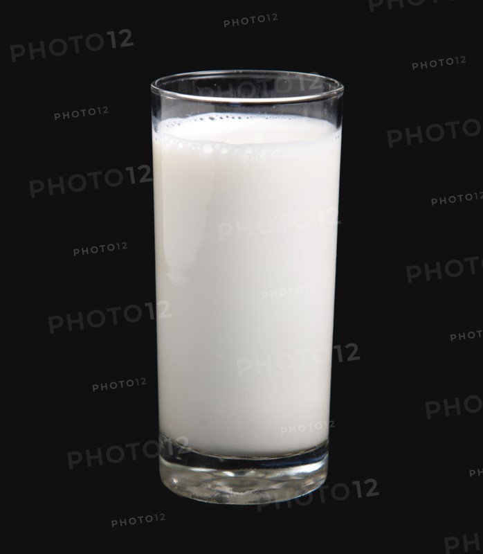 DRINK, Milk, Glass, Tumbler glass of dairy milk on a black background.