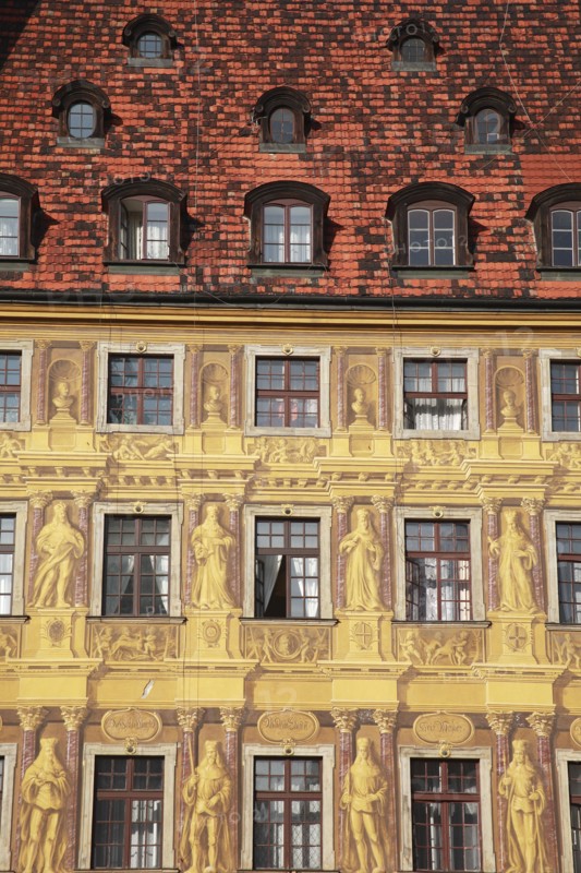 Poland, Wroclaw, detail of building facade with tromp l'oiel painted mural in the Rynek old town square.