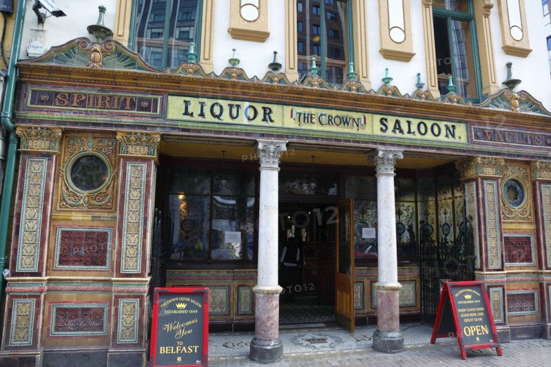 Ireland, North, Belfast, Great Victoria Street, The Crown Bar Liquor Saloon. Built in 1826 it features gas lamps and cosy snugs.