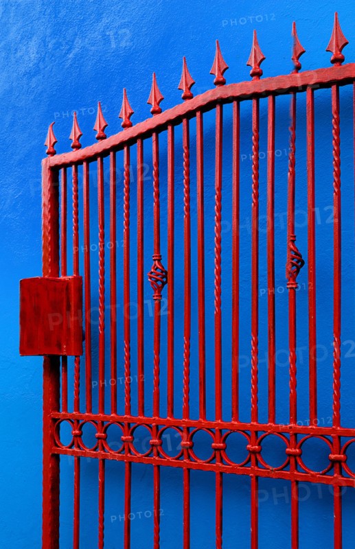 IRELAND, County Cork, Allihies Village, Colourful gate and Wall.