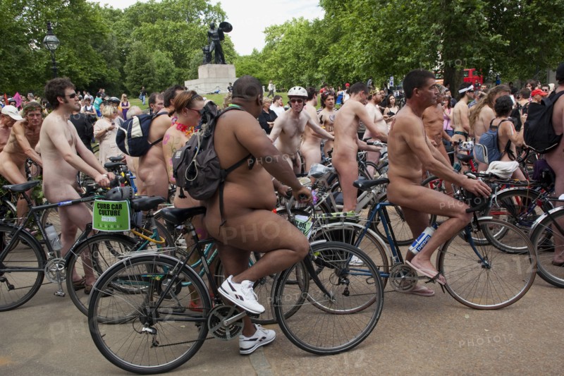 ENGLAND, London, Hyde PArk, Naked people riding their bicycles on formation at Hyde Park while participating at the world naked bike ride protest parade.