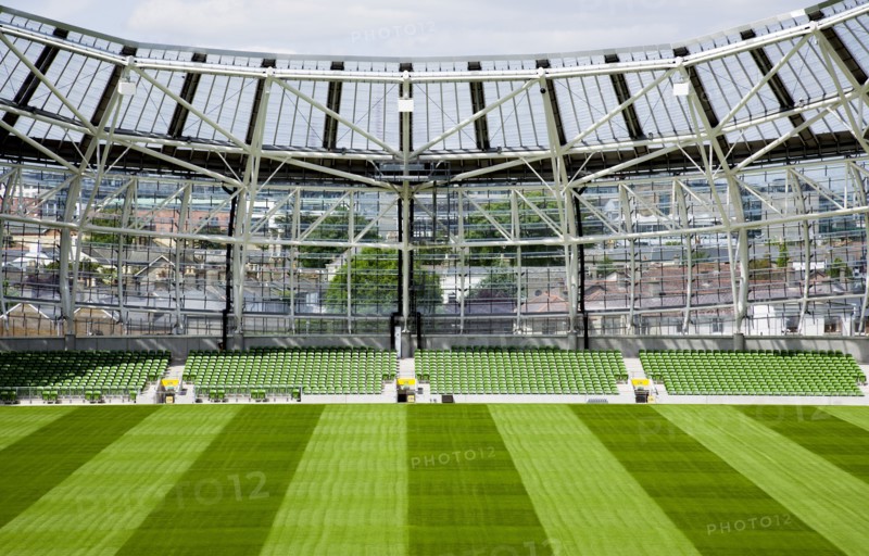 Ireland, County Dublin, Dublin City, Ballsbridge, Lansdowne Road, Aviva 50000 capacity all seater Football Stadium designed by Populus and Scott Tallon Walker. A concrete and steel structure with polycarbonate self cleaing glass exterior built at a cost of 41 million Euros. Home to the national Rugby and Soccer teams, aslo used as a concert venue showing the north end of the stadium features a smooth slope that dips to allow daylight to reach nearby residences.