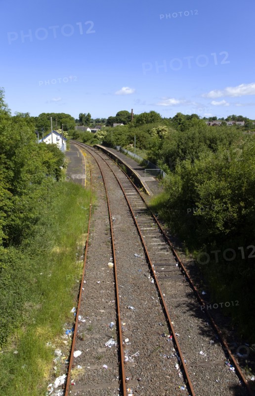 Transport, Railway, Disused track and platform in country village.