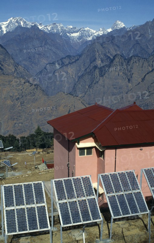 Nepal, Solar Panels for pink Hotel standing in the Himalayan landscape in Anli.