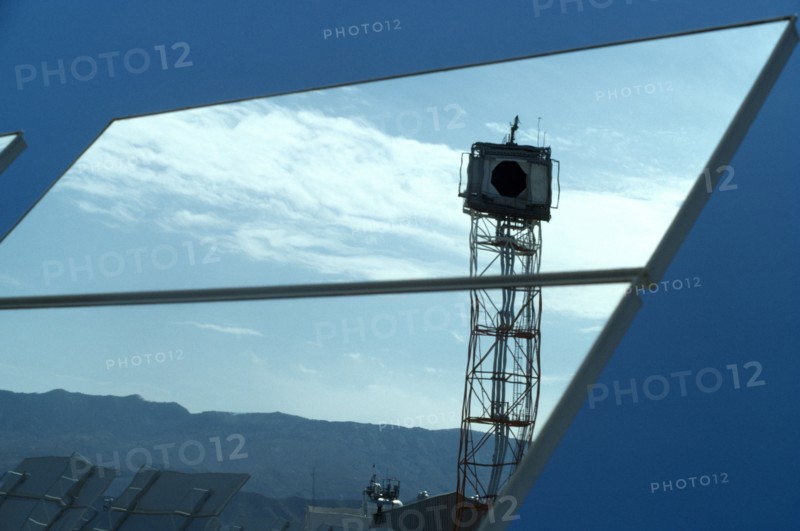 Environment, Energy, Solar Power, Reflection in a large tilting mirror used to direct the sunlight on to a solar panelled tower at a Solar Power plant in Almeria, Spain.
