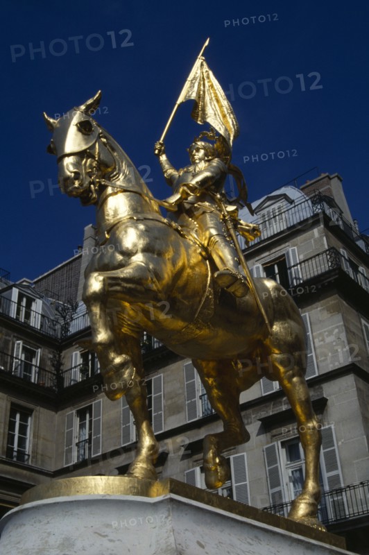 France, Ile de France, Paris, Gilded golden bronze statue of Joan of Arc on horseback in armour carrying her standard by Fremiet in Place des Pyramids in the Tuileries Quarter a focus of pilgrimage for Royalists.
