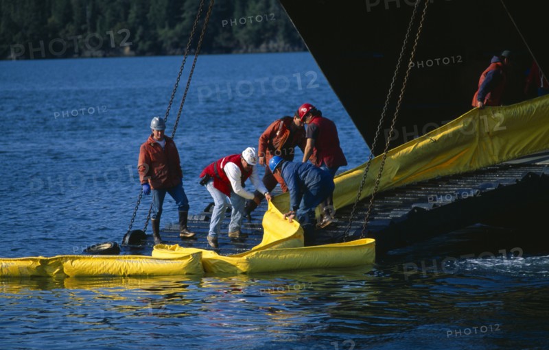 USA, Alaska, Cordova, Oil Spill prctice drill, deploying and retrieving containment booms.