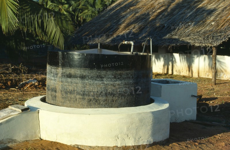 India, Biogas Digester producing methane gas from cattle manure.