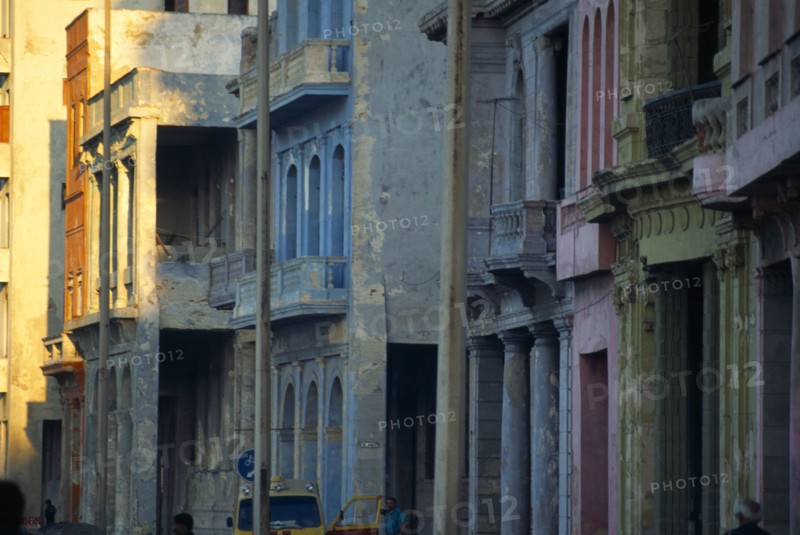 CUBA, Havana, Crumbling exterior facades of buildings along the Malecon.