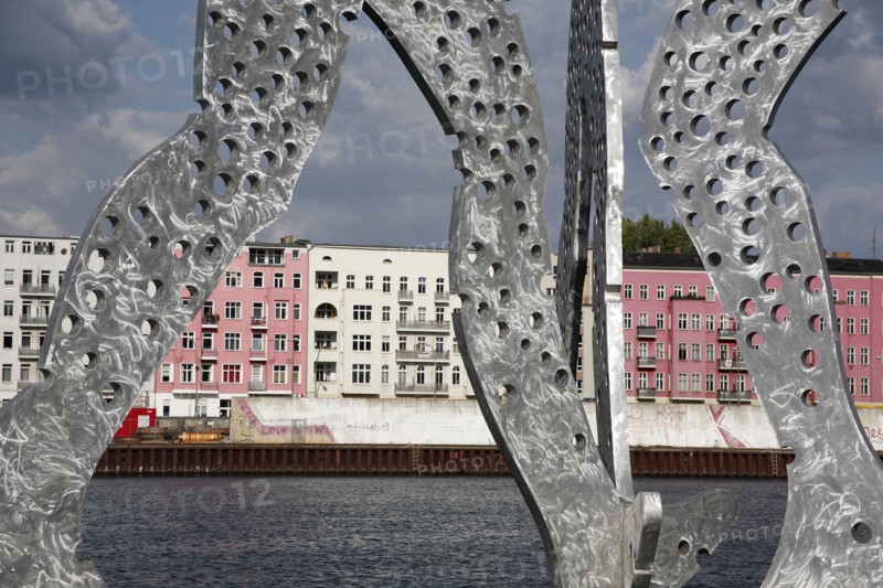 Germany, Berlin, Detail of Molecule Men sculpture 30 metres in height by Jonathan Borofsky on River Spree.