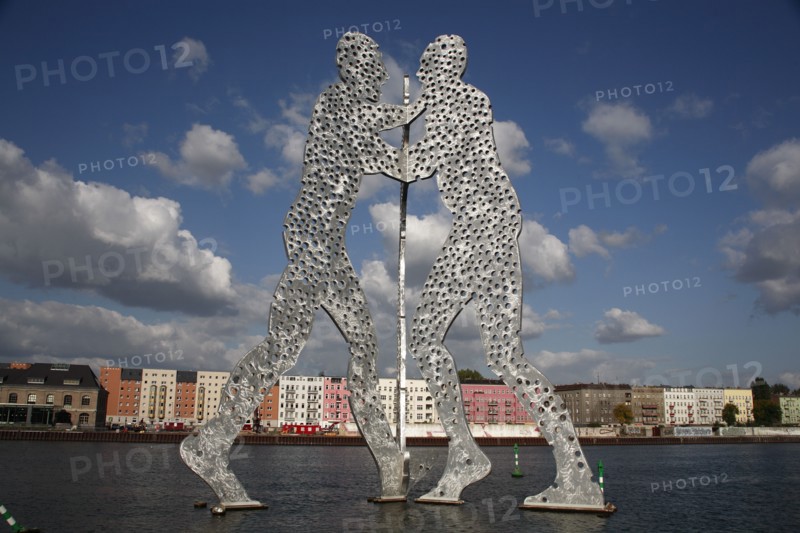 GErmany, Berlin, Molecule Men sculpture 30 m in height on River Spree by Jonathan Borofsky.