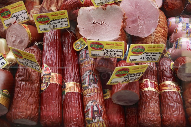Poland, Krakow, display of cold meats in Stary Kleparz market.