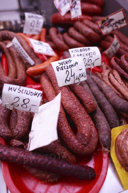 Poland, Krakow, display of cold meats in Stary Kleparz market.