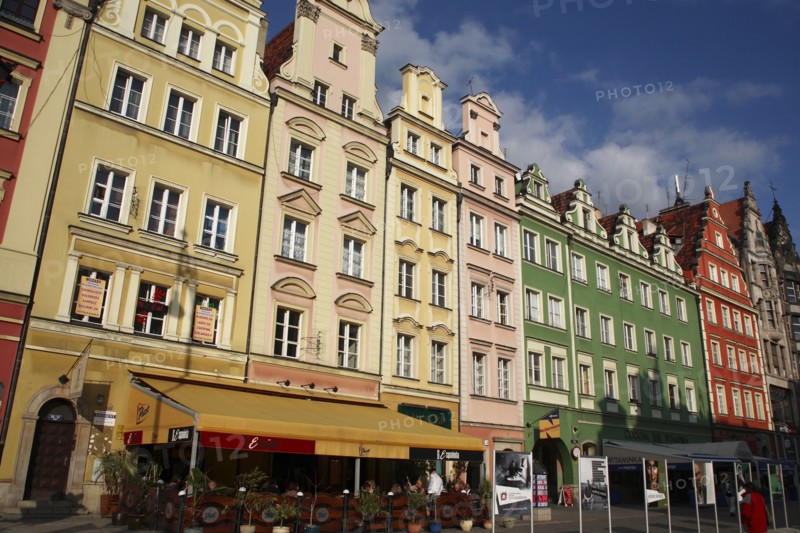 Poland, Wroclaw, pastel coloured building facades in the Rynek old town square.