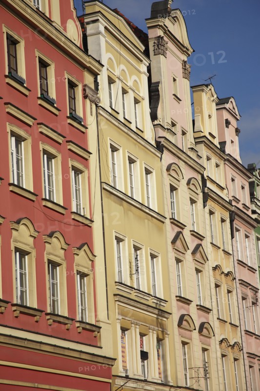 Poland, Wroclaw, pastel coloured building facades in the Rynek old town square.