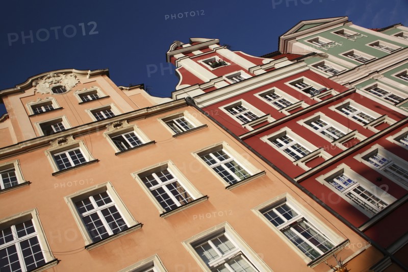 Poland, Wroclaw, pastel coloured building facades in the Rynek old town square.