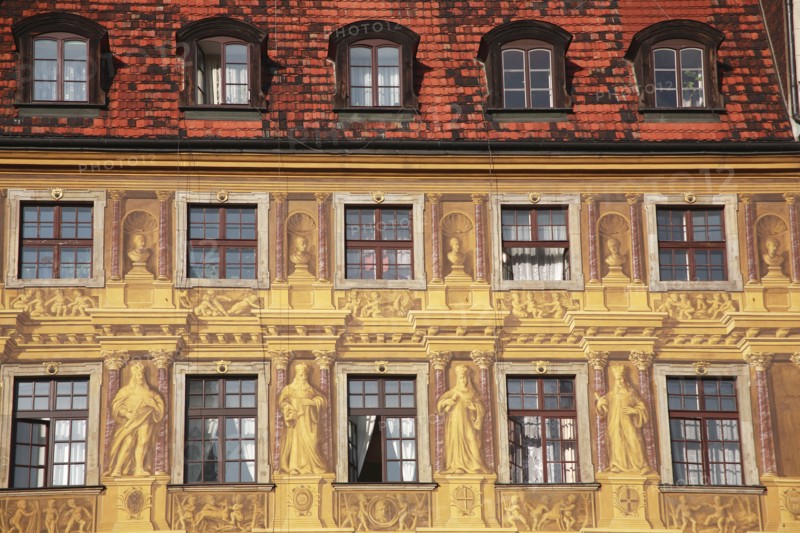 Poland, Wroclaw, detail of building facade with tromp l'oiel painted mural in the Rynek old town square.