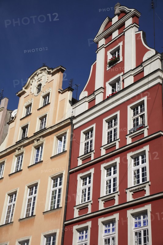Poland, Wroclaw, pastel coloured building facades in the Rynek old town square.