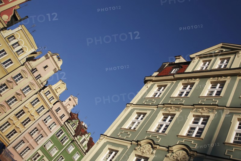 Poland, Wroclaw, angled view of pastel coloured building facades in the Rynek old town square.