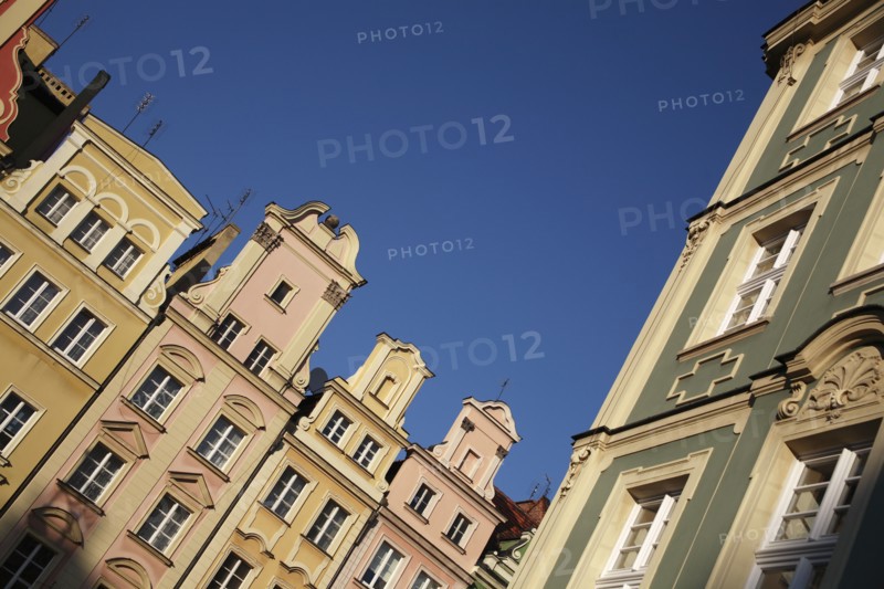 Poland, Wroclaw, pastel coloured building facades in the Rynek old town square.