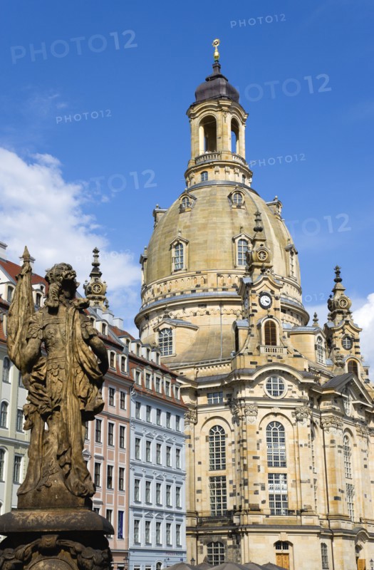 GERMANY, Saxony, Dresden, The restored Baroque church of Frauenkirch Church of Our Lady and surrounding restored buildings in Neumarkt with a statue in the foreground.