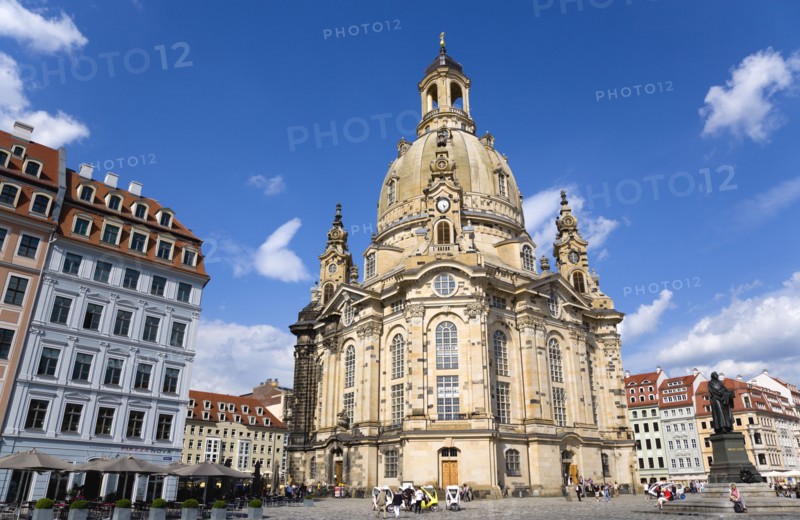 GERMANY, Saxony, Dresden, The restored Baroque church of Frauenkirch Church of Our Lady and surrounding restored buildings in Neumarkt square busy with sightseeing tourists.
