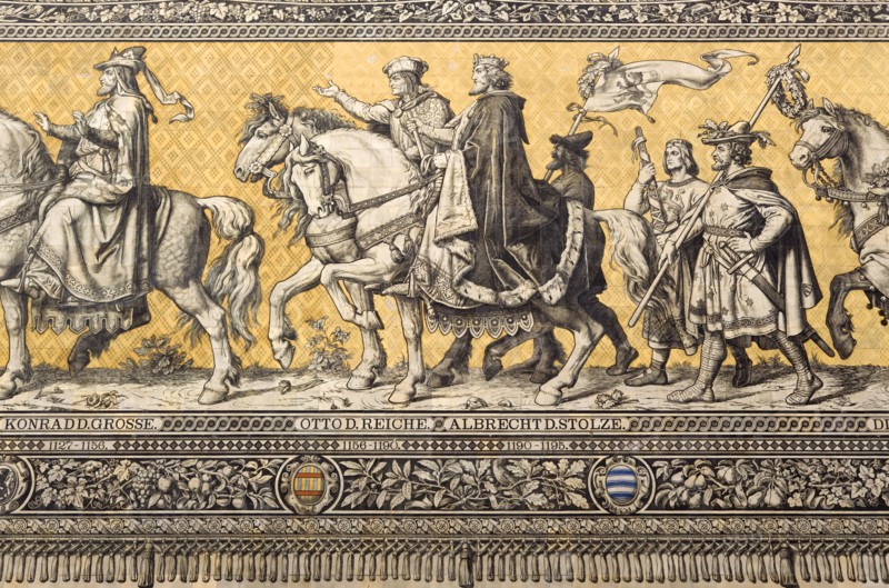 GERMANY, Saxony, Dresden, Fürstenzug or Procession of the Dukes in Auguststrasse a mural on 25,000 Meissen tiles that depicts 35 noblemen from the 12th century Konrad the Great, to Friedrich August III, Saxony's last king, who ruled from 1904-1918. It was originally painted by Wilhelm Walter between 1870 and 1876 but eventually, the stucco began to crumble and around 1906-07 it was replaced by the tiles.
