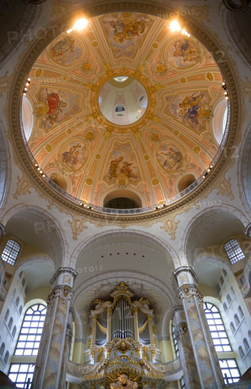 GERMANY, Saxony, Dresden, Interior of the restored Frauenkirche Church of Our Lady showing the central dome with murals and the organ.