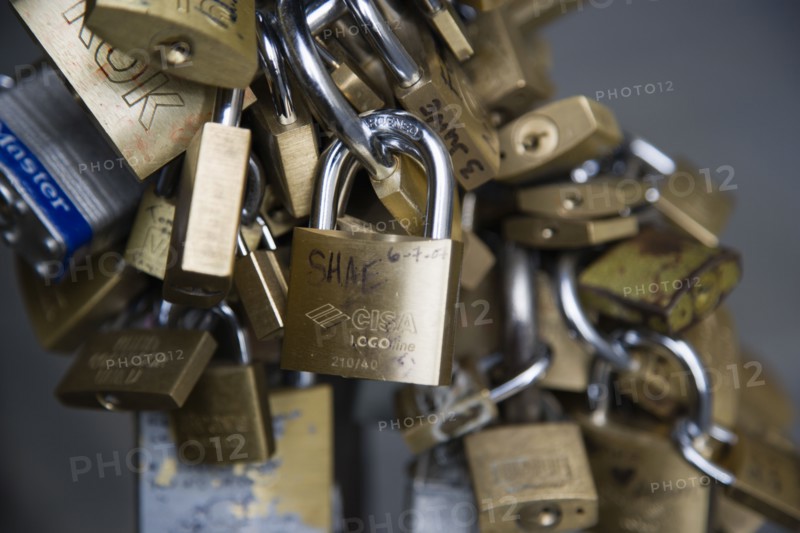 ITALY, Tuscany, Florence, Bunches of locked padlocks used by stallholders in the Vasari Corridor beside the Uffizi gallery.