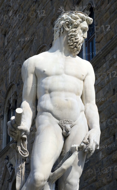 ITALY, Tuscany, Florence, The 1575 Mannerist Neptune fountain with the Roman sea God commemorating Tuscan naval victories by Ammannatti in the Piazza della Signoria beside the Palazzo Vecchio.