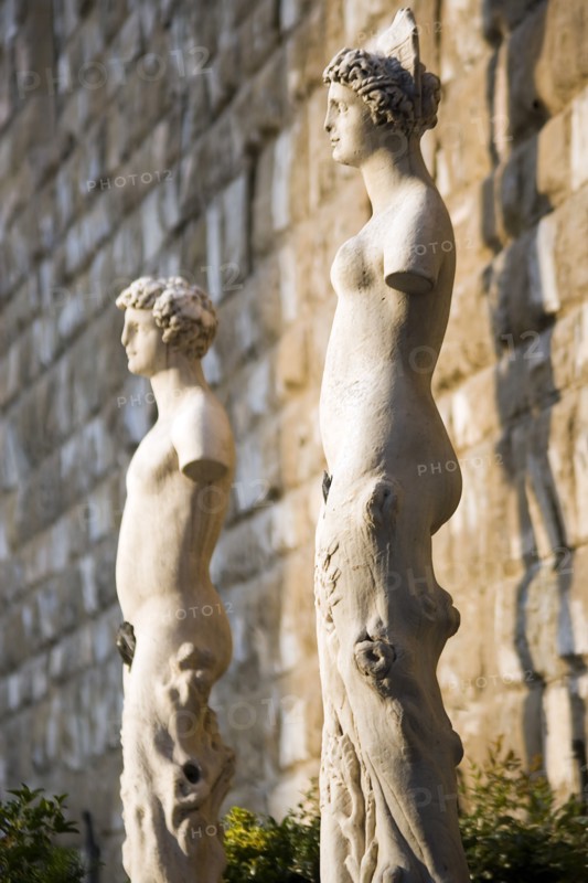 ITALY, Tuscany, Florence, Armless male and female statues outside the Palazzo Vecchio in the Piazza della Signoria.