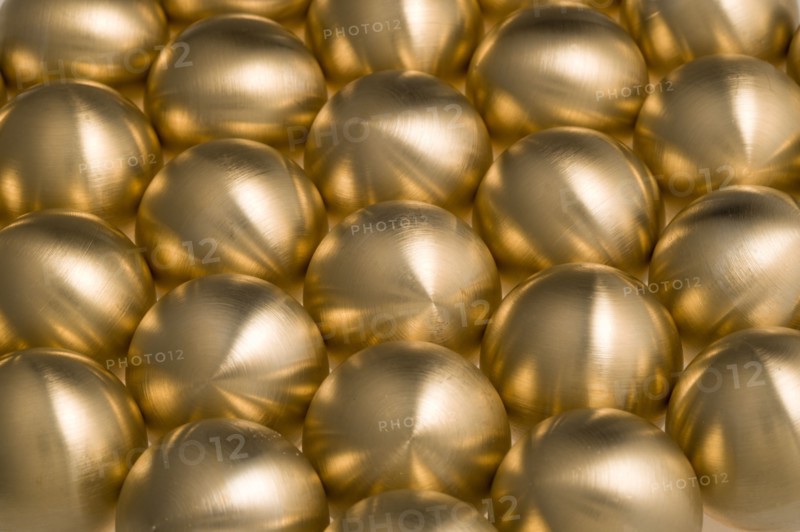 Industry, Machinery, Components, Brass metal lathe turned ball bearings.