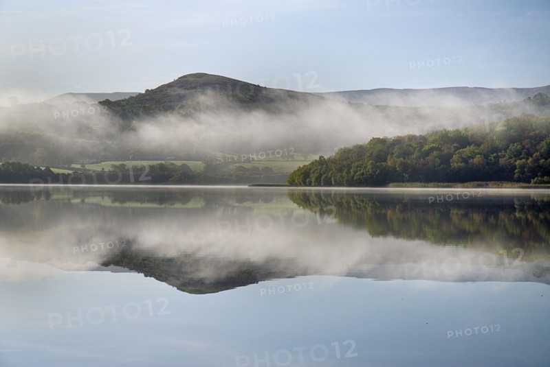 IRELAND, County Cavan, Lough MacNean, Islands in the lough on an autumn morning.