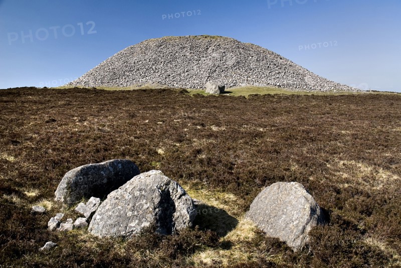 IRELAND, County Sligo, Knocknarea Mountain, Queens Maeves Cairn on summit of the mountain.
