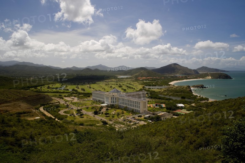 VENEZUELA, Margarita Island, East Coast, View from above of the luxurious hotel Hesperia premises and its facilities, shoot on a bright day with blue sky and white clouds.