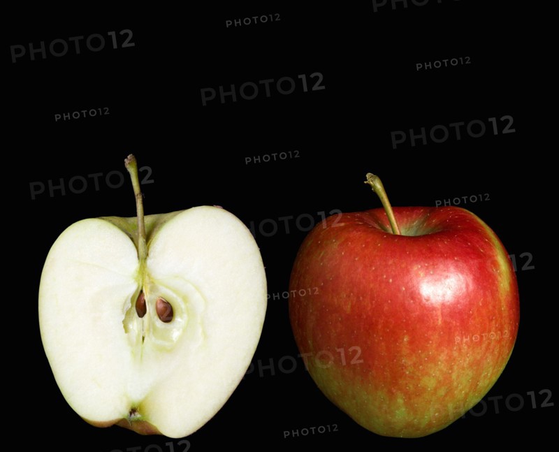 Food, Fruit, Apples, Two ripe red apples with one whole and one cut in half to show the core seeds and white flesh against a black background.