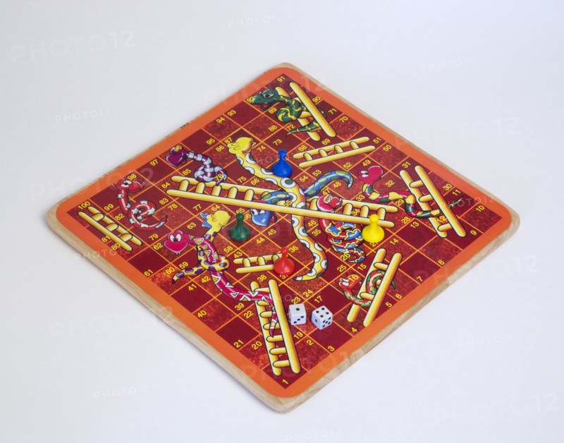 Toys, Games, Board Game, Snakes and Ladders board game with dice and counters for children against a white background.