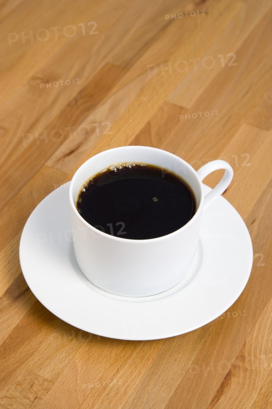 Drinks, Hot, Coffee, Cup and saucer of hot black coffee on a wooden table.
