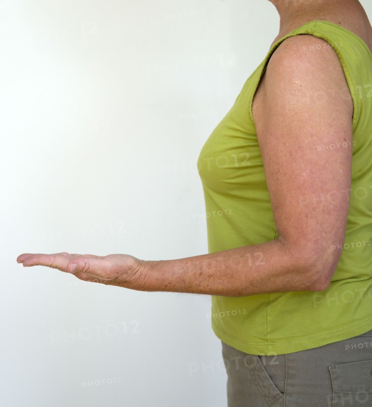 Health, Body, Arms, Woman in profile from side with arm bent at elbow with palm of hand facing upwards and fingers outrstretched.