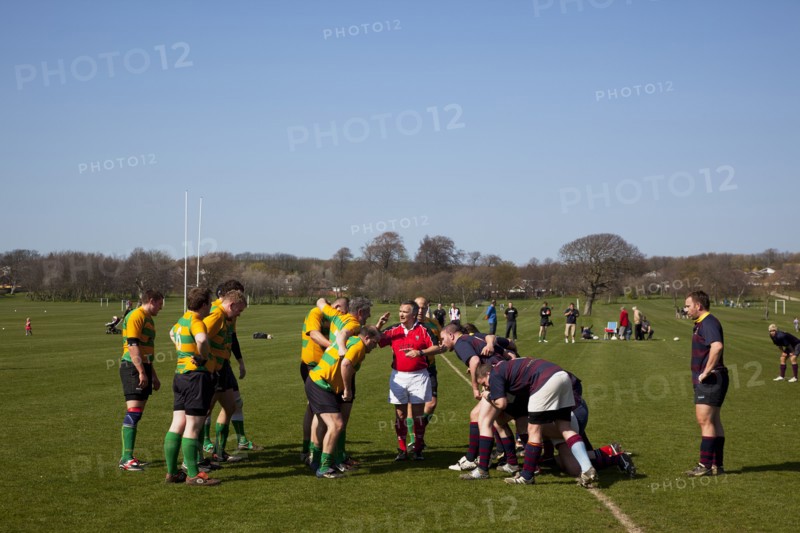 England, West Sussex, Shoreham-by-Sea, Rugby Teams playing on Victoria Park playing fields. Referee setting scrum.