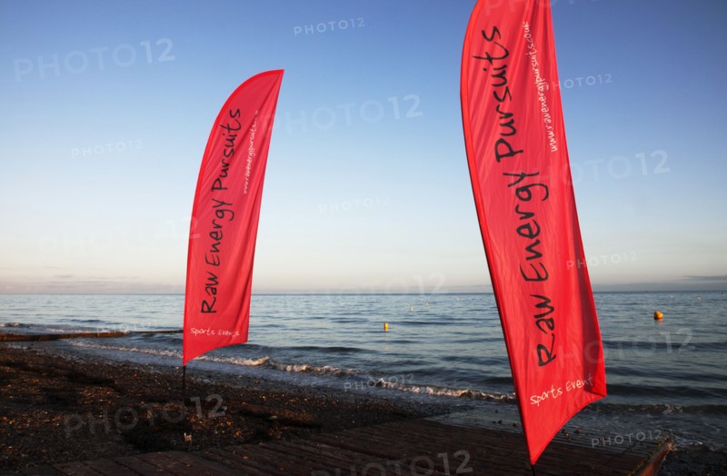 England, West Sussex, Goring-by-Sea, Worthing Triathlon 2009,  Flags marking start of the swim portion of the race.