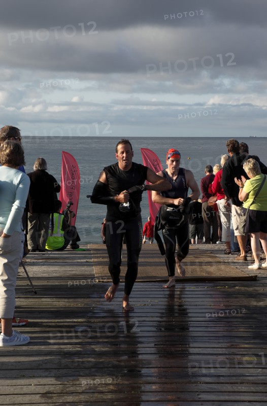 England, West Sussex, Goring-by-Sea, Worthing Triathlon 2009, male competitors at the swim exit.