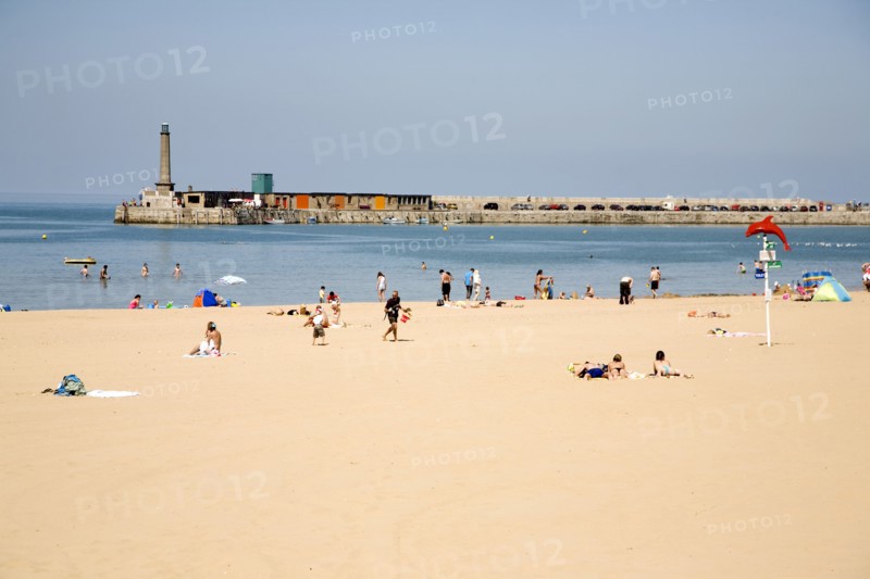 England, Kent, Margate beach with sunbathers.