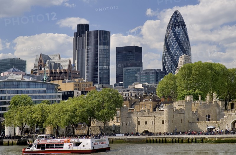 England, London, Tower Bridge, View across River Thames and Tower of London toward the City financial district with the Gherkin visible.
