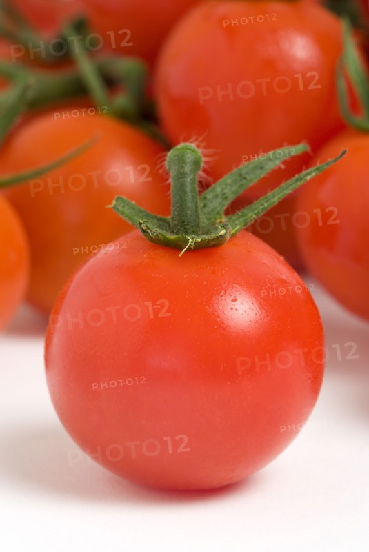 Food, Fruit, Tomato, Ripe red cherry tomatoes on the vine against a white background.
