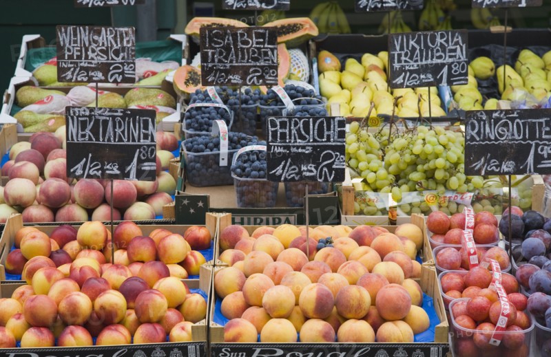 Vienna, Austria. The Naschmarkt. Display of fresh fruit for sale including peaches nectarines blueberries plums and grapes. Austria Austrian Republic Vienna Viennese Wien Europe European City Capital Naschmarkt Market Display Fresh Food Fruit Vegetables Veg Vegetable Stall Shop Store Destination Destinations Osterreich Viena Western Europe