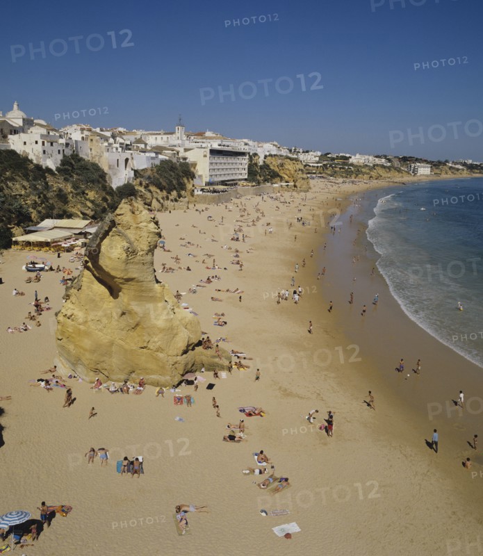 Albufeira, Algarve, Portugal. Fishermans beach. Portugal Portuguese European Europe Algarve Albufeira Beach Travel Tourism Fisherman Shore Water Sand Holiday Coast Vacation Blue Destination Destinations Holidaymakers Portugese Sand Sandy Beaches Tourism Seaside Shore Tourist Tourists Vacation Southern Europe Sunbather