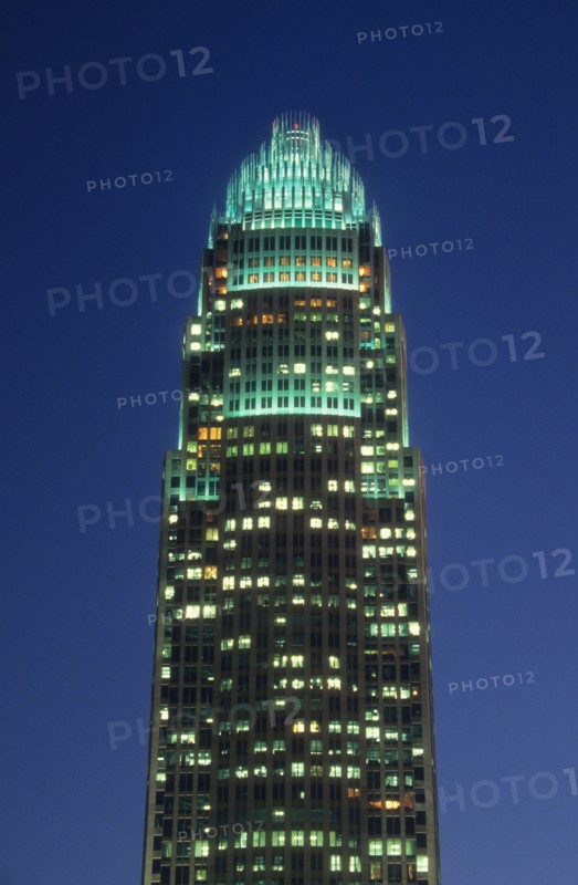 Charlotte, North Carolina, USA. Bank of America headquarters illuminated at night. America Architectural Architectural Feature Architecture Bank Of America Bank Of America Plaza Building Buildings Charlotte Cities City Dusk Evening High Rise High Rises High-rise High-rises Illuminated Night Night time Night-Time No One No People Nobody North Carolina Outdoors Outside Skyscraper Skyscrapers US USA United States Urban Vertical bank banking nc tower 1 American Nightfall Twilight Evenfall Crespuscle Crespuscule Gloam Gloaming North America North Carolina First in Flight Northern Single unitary United States of America Warm Light