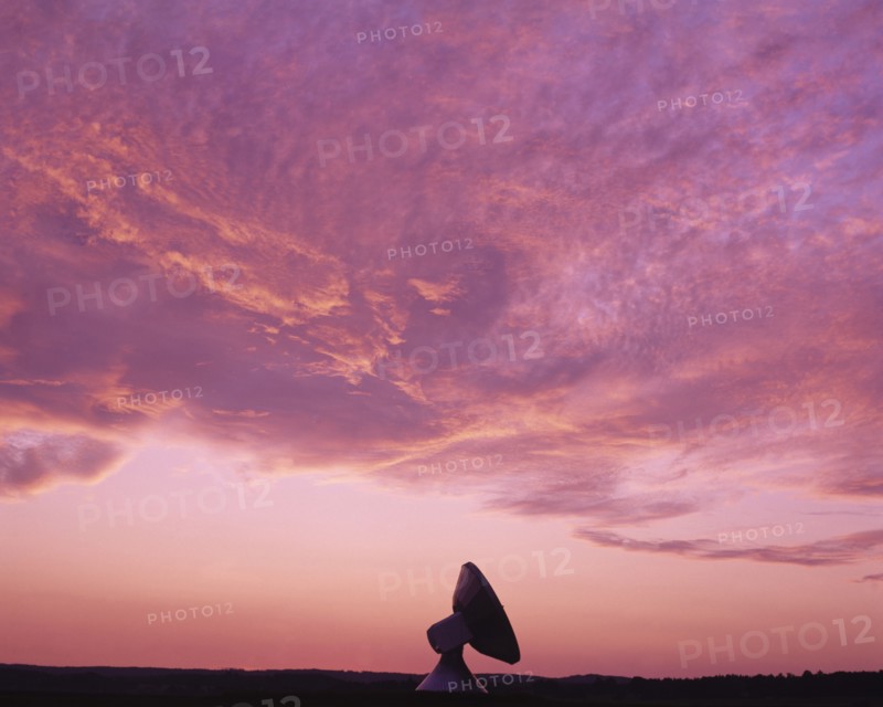 Bavaria, Germany, Communications. Satellite dish against pink and purple sunset sky. Germany German Bavaria Bavarian Satelite Dish Receiver Silhouette Silhouetted Pink Purple Sky Clouds Communications Communication Bayern Blue Clouds Cloud Sky Color Deutschland European Solid Outline Shade Silhouette Solid Outline Shade Silhouetted Sundown Atmospheric Western Europe White